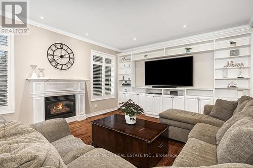 2040 Oakbrook Circle, Ottawa, ON - Indoor Photo Showing Living Room With Fireplace