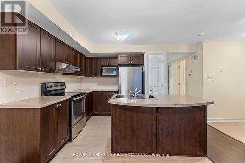 2 - 135 Bluestone, Ottawa, ON - Indoor Photo Showing Kitchen With Stainless Steel Kitchen With Double Sink