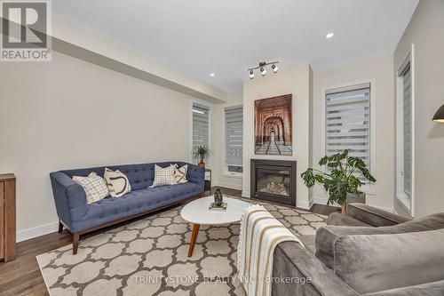 716 Twist Way, Ottawa, ON - Indoor Photo Showing Living Room With Fireplace