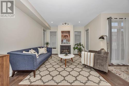 716 Twist Way, Ottawa, ON - Indoor Photo Showing Living Room With Fireplace