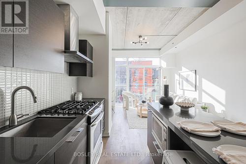 204 - 41 Ossington Avenue, Toronto, ON - Indoor Photo Showing Kitchen With Upgraded Kitchen