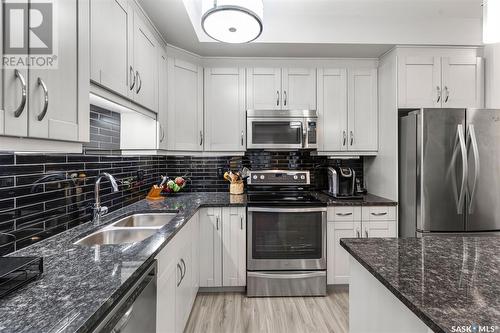 121 1025 Moss Avenue, Saskatoon, SK - Indoor Photo Showing Kitchen With Double Sink