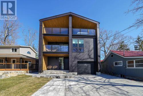 12 Warwick Avenue, Lambton Shores (Grand Bend), ON - Outdoor With Deck Patio Veranda With Facade