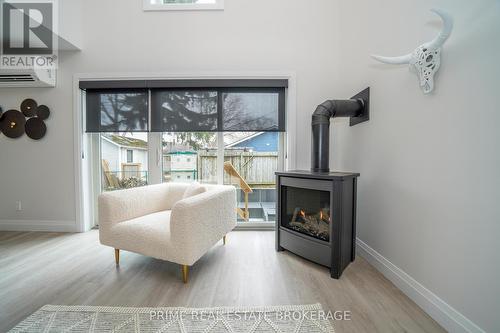 12 Warwick Avenue, Lambton Shores (Grand Bend), ON - Indoor With Fireplace