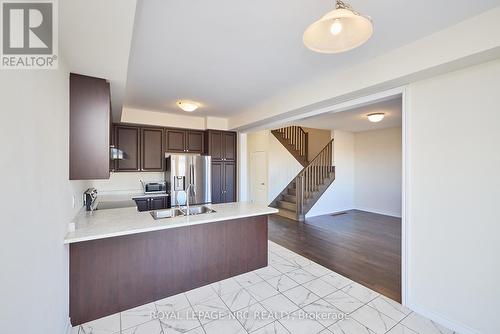 10 Peach Street, Thorold (560 - Rolling Meadows), ON - Indoor Photo Showing Kitchen With Double Sink