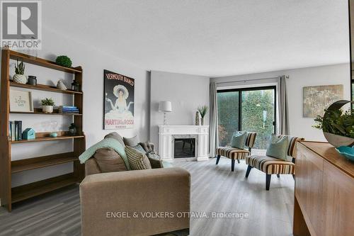 46 Bethune Court, Ottawa, ON - Indoor Photo Showing Living Room With Fireplace