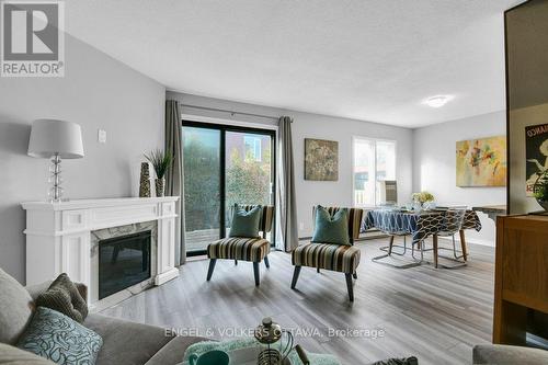 46 Bethune Court, Ottawa, ON - Indoor Photo Showing Living Room With Fireplace