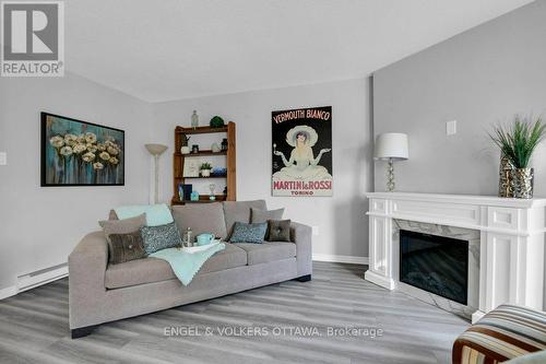 46 Bethune Court, Ottawa, ON - Indoor Photo Showing Living Room With Fireplace