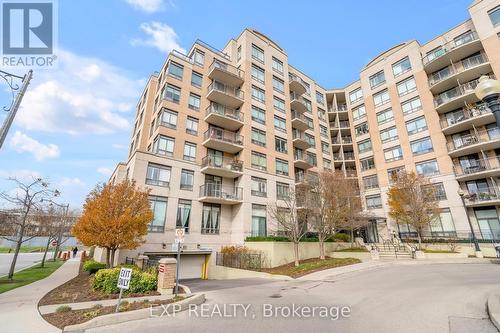 102 - 16 Dallimore Circle, Toronto, ON - Outdoor With Facade