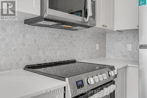 102 - 16 Dallimore Circle, Toronto, ON - Indoor Photo Showing Kitchen