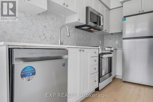 102 - 16 Dallimore Circle, Toronto, ON - Indoor Photo Showing Kitchen