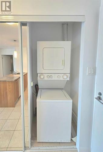 3001 - 38 Grenville Street, Toronto, ON - Indoor Photo Showing Laundry Room