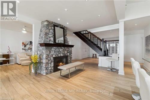 899 Edgemere Road, Fort Erie (334 - Crescent Park), ON - Indoor Photo Showing Living Room With Fireplace