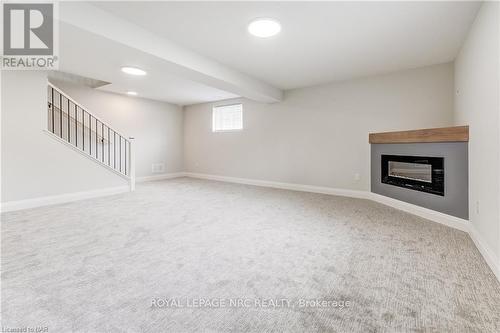 64 Hickory Court, Port Colborne, ON - Indoor With Fireplace