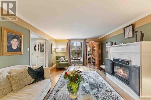 5 Erinlea Court, Ottawa, ON - Indoor Photo Showing Living Room With Fireplace