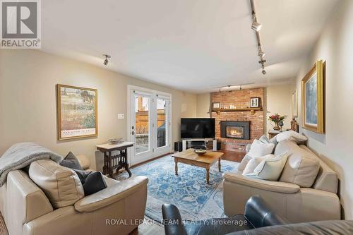 5 Erinlea Court, Ottawa, ON - Indoor Photo Showing Living Room With Fireplace