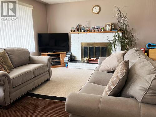 2199 Castillou Crescent, Merritt, BC - Indoor Photo Showing Living Room With Fireplace