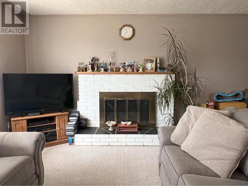 2199 Castillou Crescent, Merritt, BC - Indoor Photo Showing Living Room With Fireplace