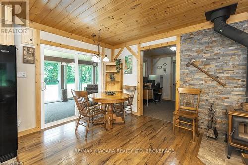 12264 Brawn Road, Wainfleet (880 - Lakeshore), ON - Indoor Photo Showing Dining Room With Fireplace