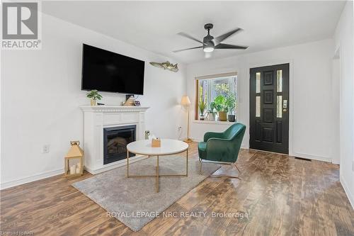 10 Monck Street, St. Catharines (458 - Western Hill), ON - Indoor Photo Showing Living Room With Fireplace