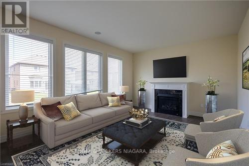 9462 Tallgrass Avenue, Niagara Falls (224 - Lyons Creek), ON - Indoor Photo Showing Living Room With Fireplace