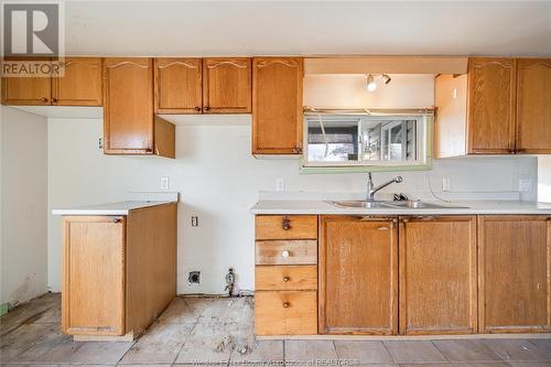 32 Wilder Drive North, Lakeshore, ON - Indoor Photo Showing Kitchen With Double Sink