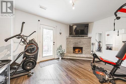 26 - 1155 Paramount Drive, Hamilton, ON - Indoor With Fireplace