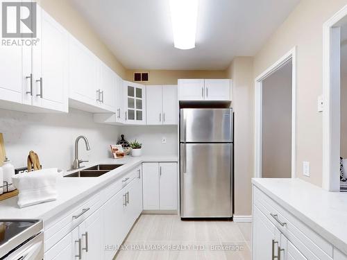 903 - 10 Parkway Forest Drive, Toronto, ON - Indoor Photo Showing Kitchen With Double Sink