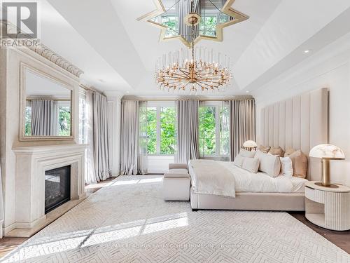 100 Ardwold Gate, Toronto, ON - Indoor Photo Showing Bedroom With Fireplace