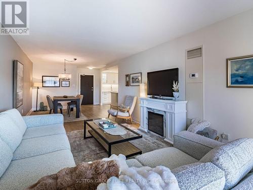 1605 - 820 Burnhamthorpe Road, Toronto, ON - Indoor Photo Showing Living Room With Fireplace