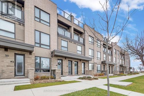 2 - 18 Humberwood Boulevard, Toronto, ON - Outdoor With Facade