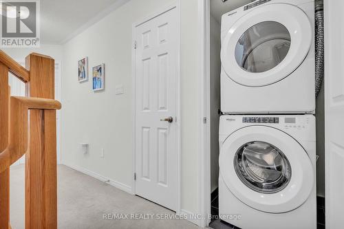 2 - 18 Humberwood Boulevard, Toronto, ON - Indoor Photo Showing Laundry Room