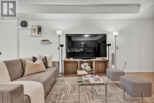 2 - 18 Humberwood Boulevard, Toronto, ON - Indoor Photo Showing Living Room