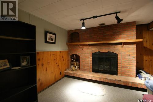 4 Young Crescent, Saskatoon, SK - Indoor Photo Showing Living Room With Fireplace