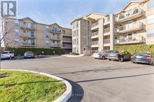 314 - 1490 Bishops Gate, Oakville, ON - Outdoor With Balcony With Facade