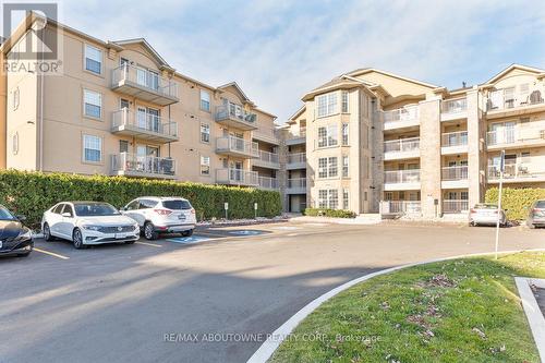 314 - 1490 Bishops Gate, Oakville, ON - Outdoor With Balcony With Facade