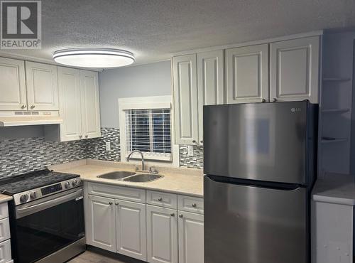 7 5125 North Nechako Road, Prince George, BC - Indoor Photo Showing Kitchen With Double Sink