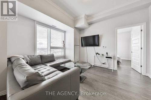 609 - 1105 Leger Way, Milton, ON - Indoor Photo Showing Living Room