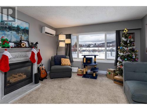 4635 Straume Avenue, Terrace, BC - Indoor Photo Showing Living Room With Fireplace