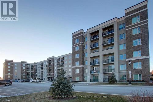 509 - 610 Farmstead Drive, Milton, ON - Outdoor With Facade