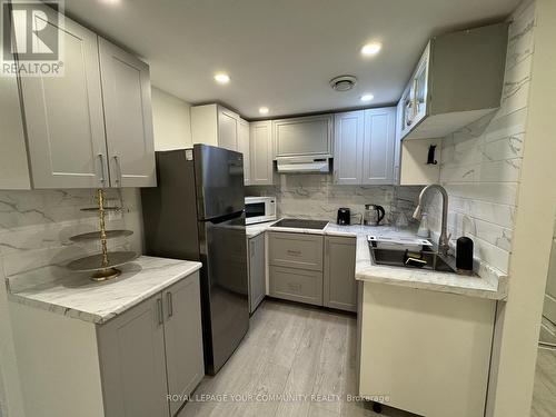 Lower - 27 George Street, Richmond Hill, ON - Indoor Photo Showing Kitchen With Double Sink