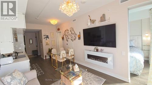 2512 - 185 Roehampton Avenue, Toronto, ON - Indoor Photo Showing Living Room With Fireplace