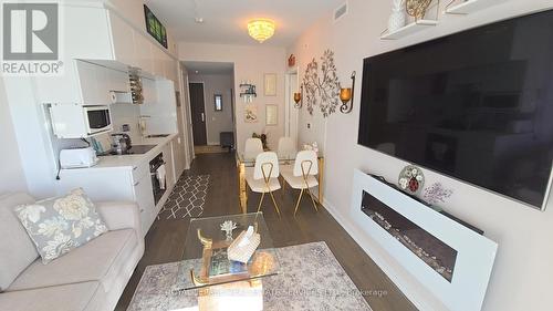 2512 - 185 Roehampton Avenue, Toronto, ON - Indoor Photo Showing Living Room With Fireplace