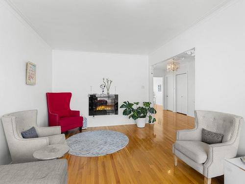 Living room - 2290 Rue Bourgoin, Montréal (Saint-Laurent), QC - Indoor Photo Showing Living Room With Fireplace