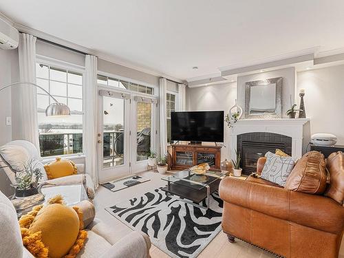 Salon - 403-60 Rue Du Lac, Magog, QC - Indoor Photo Showing Living Room With Fireplace