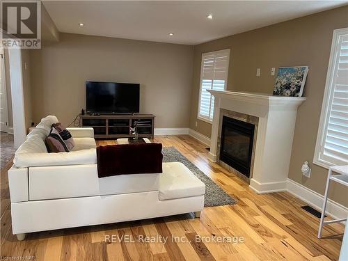 6505 Armelina Crescent, Niagara Falls (219 - Forestview), ON - Indoor Photo Showing Living Room With Fireplace