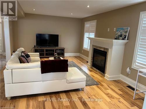 6505 Armelina Crescent, Niagara Falls (219 - Forestview), ON - Indoor Photo Showing Living Room With Fireplace