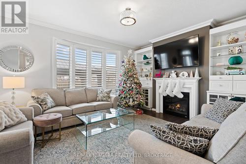 8849 Dogwood Crescent, Niagara Falls (222 - Brown), ON - Indoor Photo Showing Living Room With Fireplace