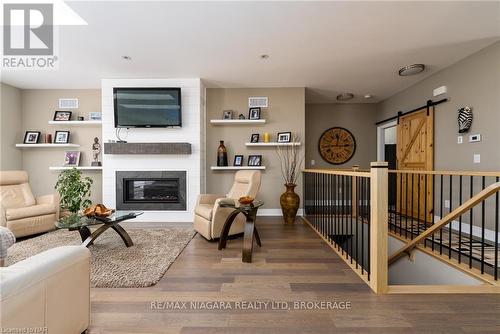 24 Prospect Point Road N, Fort Erie (335 - Ridgeway), ON - Indoor Photo Showing Living Room With Fireplace