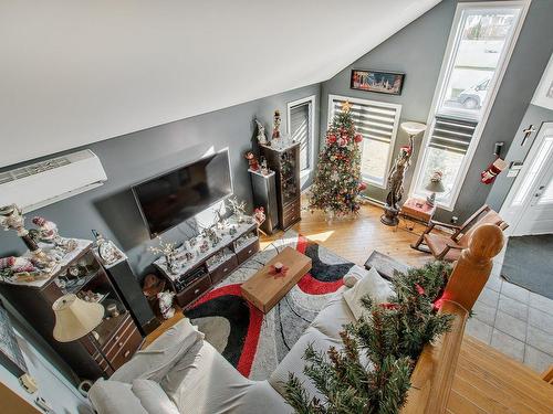 Salon - 1350 Rue De L'Arc-En-Ciel, Laval (Saint-François), QC - Indoor Photo Showing Living Room With Fireplace